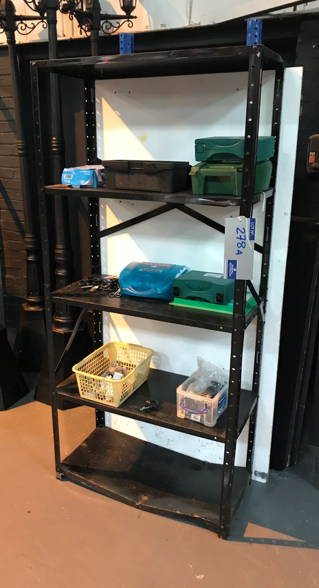 A Steel Rack and Contents including first aid kits.