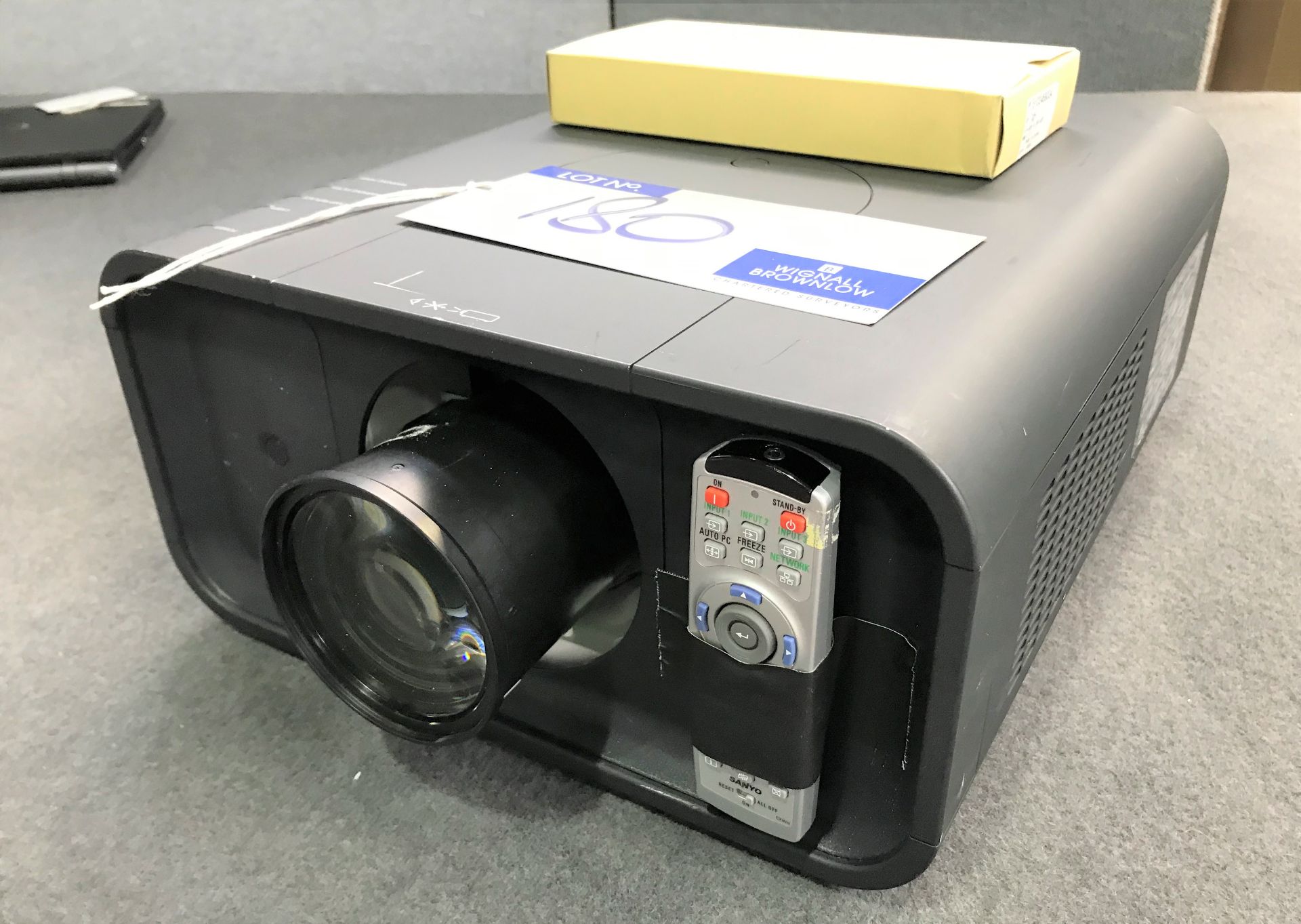 A Sanyo PROxtra X Model PLC-XP100BKL Multiverse Projector No.G7201708 with remote controller and
