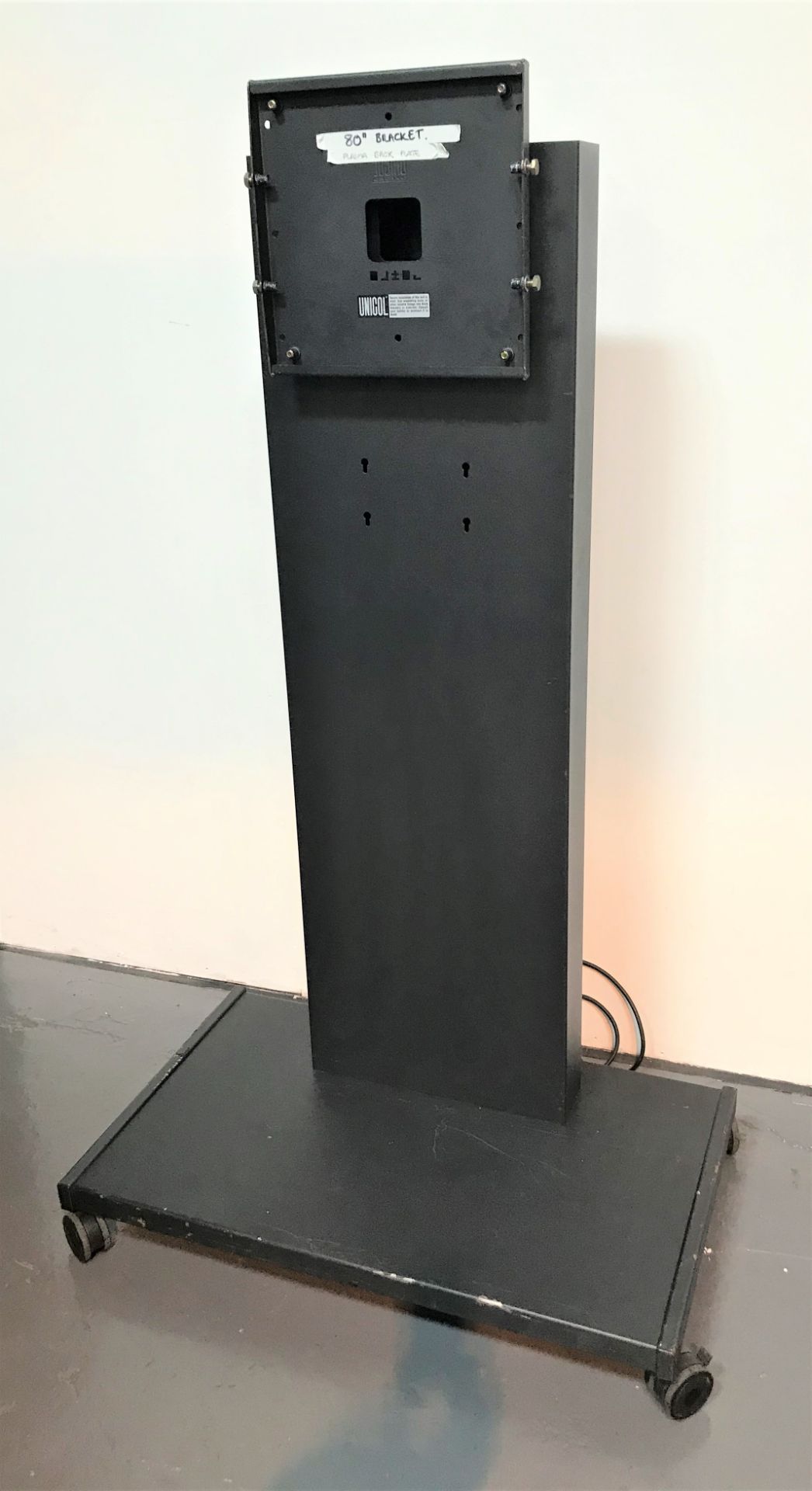 A Unicol Rhobus Mobile Stand for 80in Plasma Screen, 950mm x 550mm base, 1570mm h (located at ADA