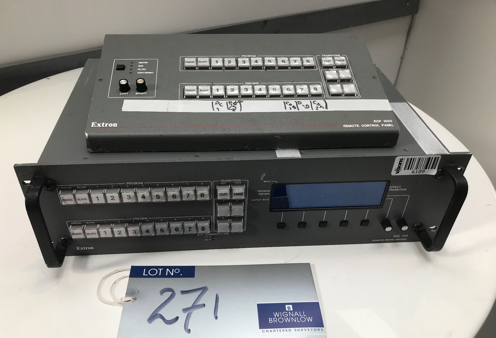 An Extron SGS408 Seamless Graphic Video Switcher with RCP1000 Remote Control Panel (located at