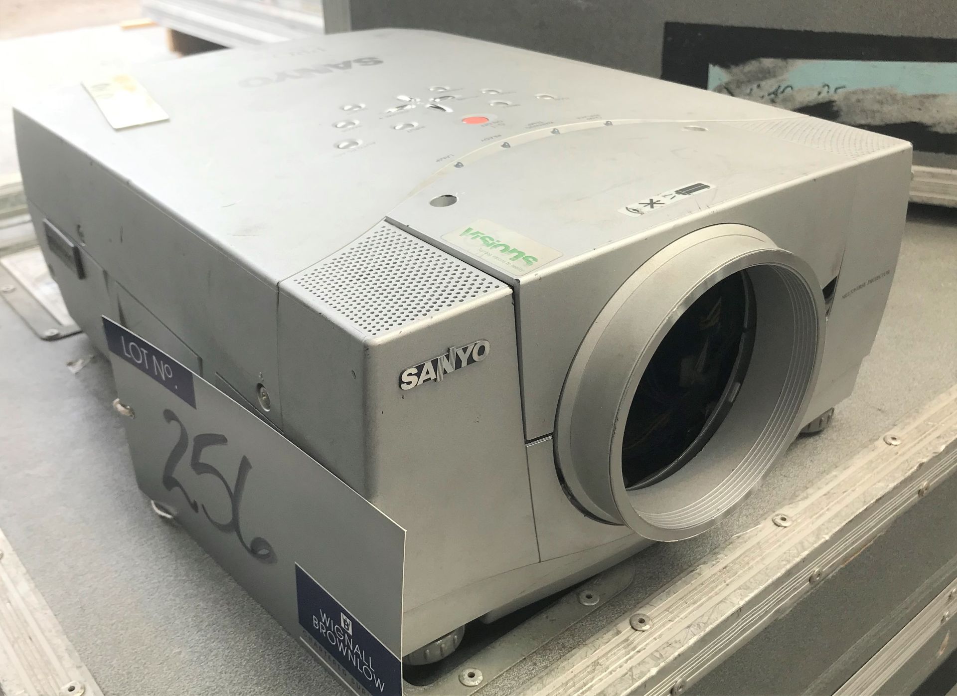 A Sanyo PROxtraX Model PLC-XP57L Multiverse Projector No.G7X11857 with flight case, 670mm x 270mm