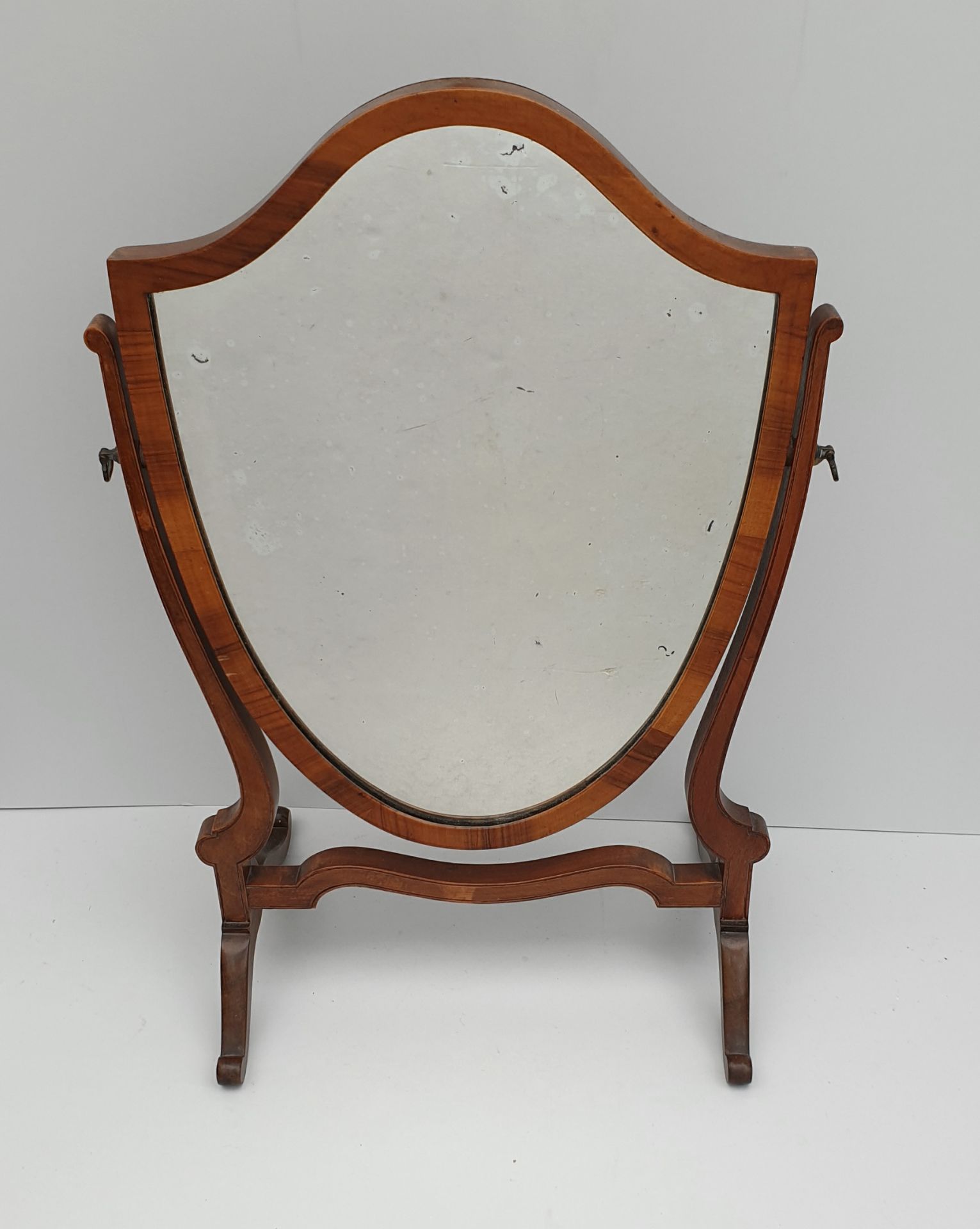 Edwardian Harwood Mirror Shield Shape Measures 14 inches by 23 inches tall.