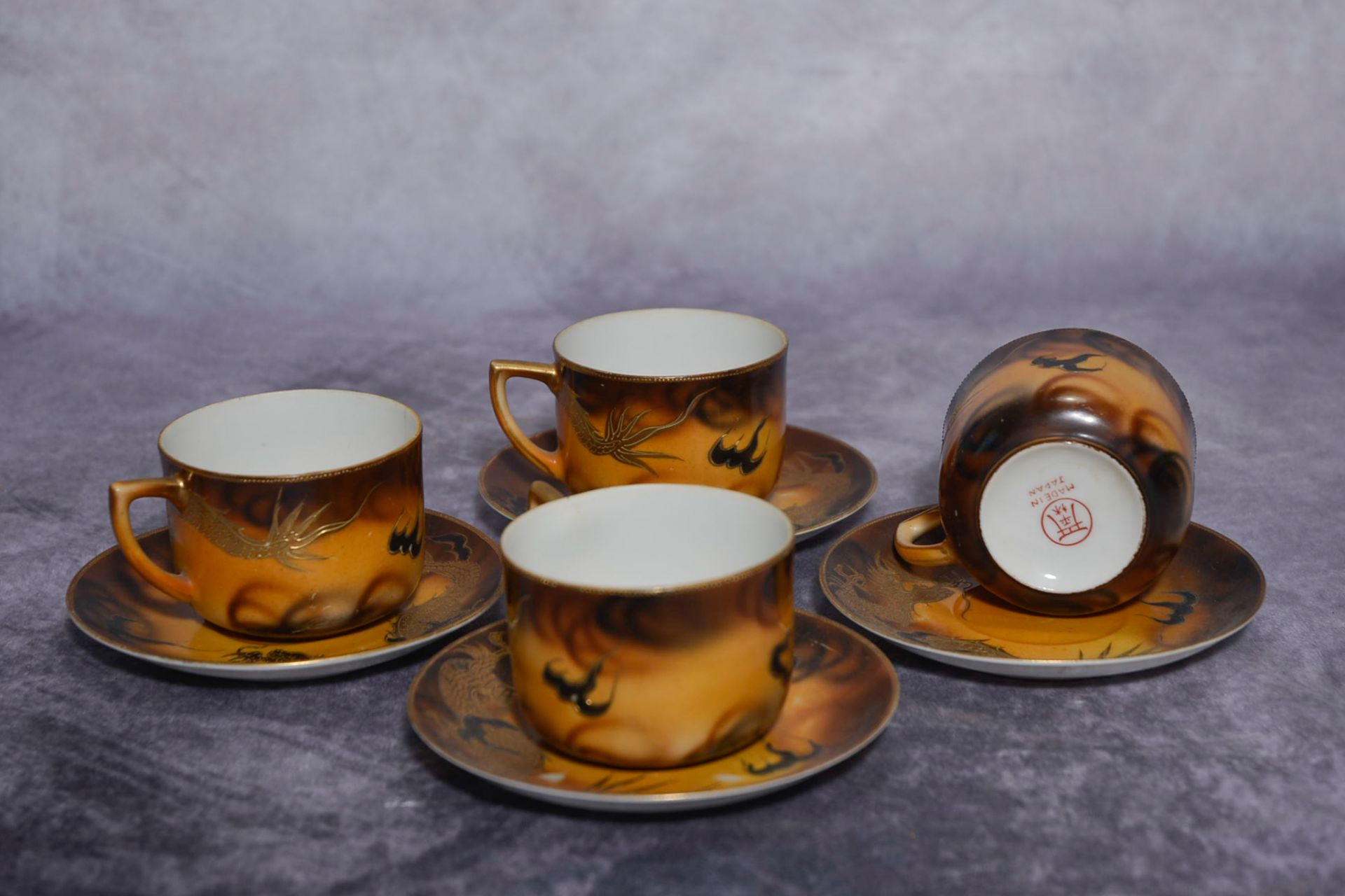 Set of four Japanese cups and saucers