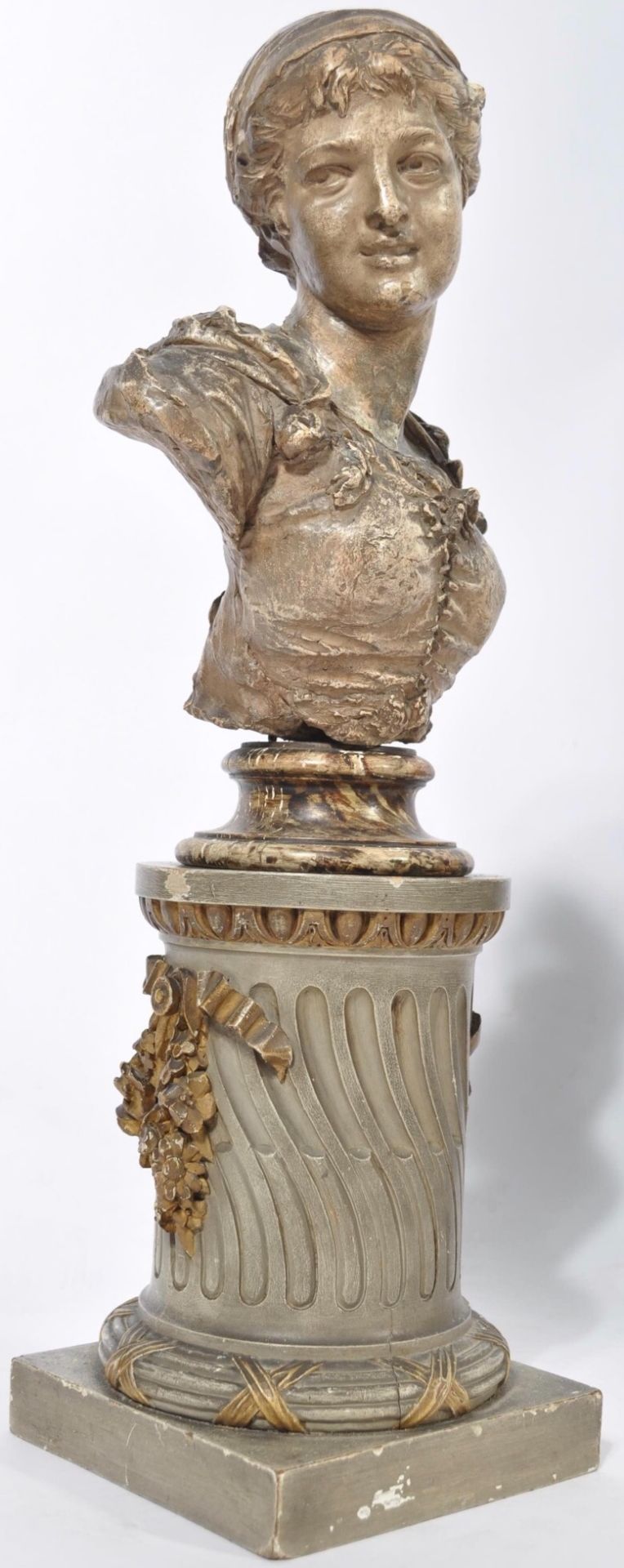 A C19th painted plaster bust on a painted carved wooden plinth