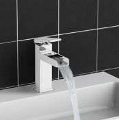 (QP64) Seaton 1 Lever Waterfall basin mixer tap. This modern style chrome single lever basin m... (