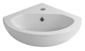 (XL106) Perdita Wall mounted corner cloakroom basin. This vitreous china wall mounted corner cl...