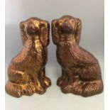 Two mismatched Antique Wally Fireside Dogs Copper Lustre Spaniels 20cm Tall