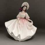 A Royal Doulton porcelain figurine, Sunday Best HN2698, modelled by Peggy Davies