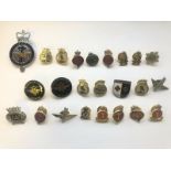 A group of predominantly modern military pin badges