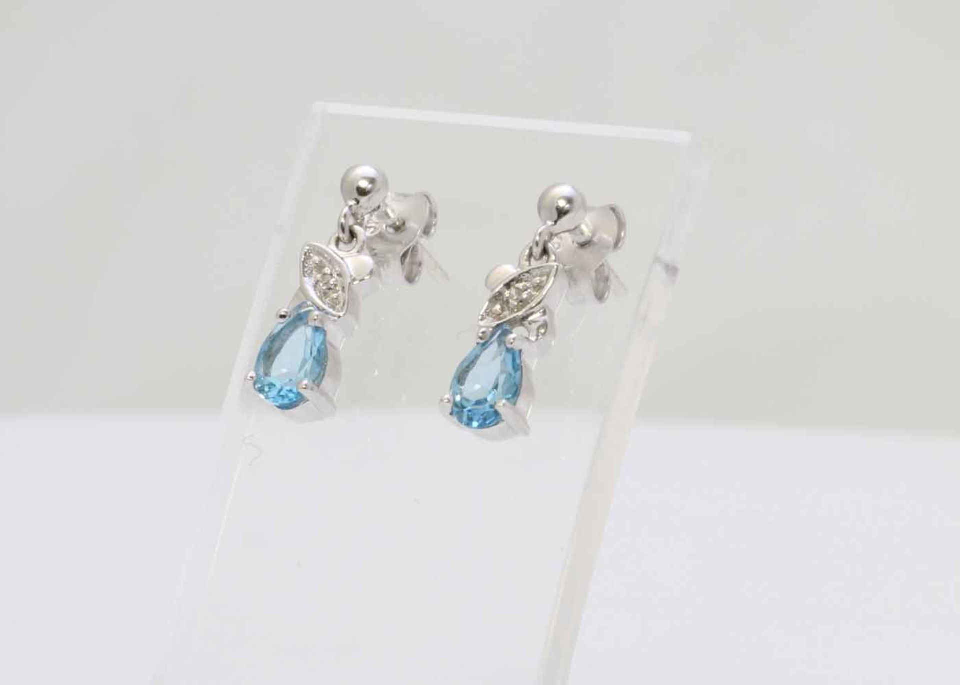 9k White Gold Diamond And Blue Topaz Earring 0.01 Carats