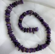 Charoite 300 cts Drilled tumbled slices 38 Cm long