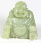 Laughing Buddha made of jade, light green