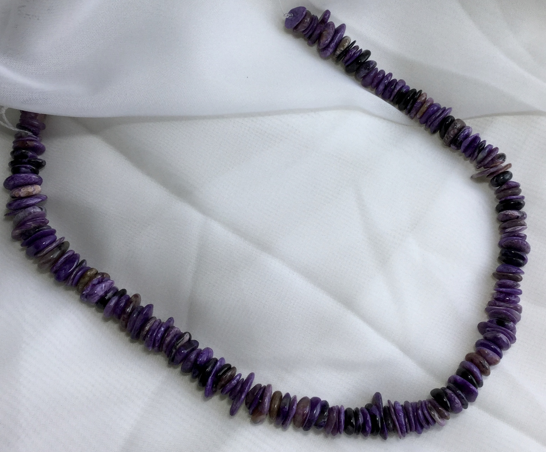 Charoite 300 cts Drilled tumbled slices 38 Cm long - Image 2 of 3