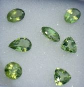 Multi Péridot gems solitaires 5.50cts Faceted multi shape assortment