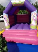 Fairground funfair new bouncy castle 12ft by 14ft with blower pegs and mats