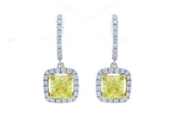 GIA Certfied Fancy Intense Yellow Diamond Earrings 2.62 Carats.