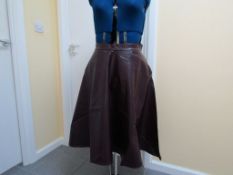 10 x ASOS Faux Leather Skater Skirt. Plum. 27 inch Waist. Brand New. no vat on hammer.You will get