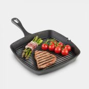 (V201) Seasoned Cast Iron Griddle Pan Traditional cast iron construction, 39.5cm X 26.3cm X 6....