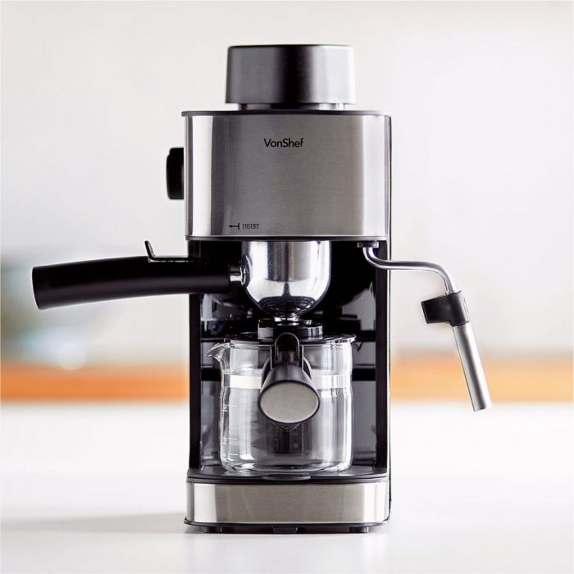 (NN8) 4 Bar Espresso Machine Features include a glass carafe that can hold enough for 4 espres...