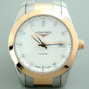Longines Conquest Mother of Pearl. Gold Steel Wrist Watch