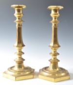 C19th pair of gilded brass candlesticks