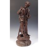 C19th large bronzed spelter figure of a sculptor at work