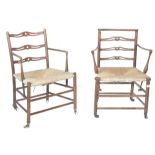 Pair of Georgian ladder back armchairs with rush seats and casters
