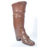 An oversized leather clad Georgian style boot, of modern construction
