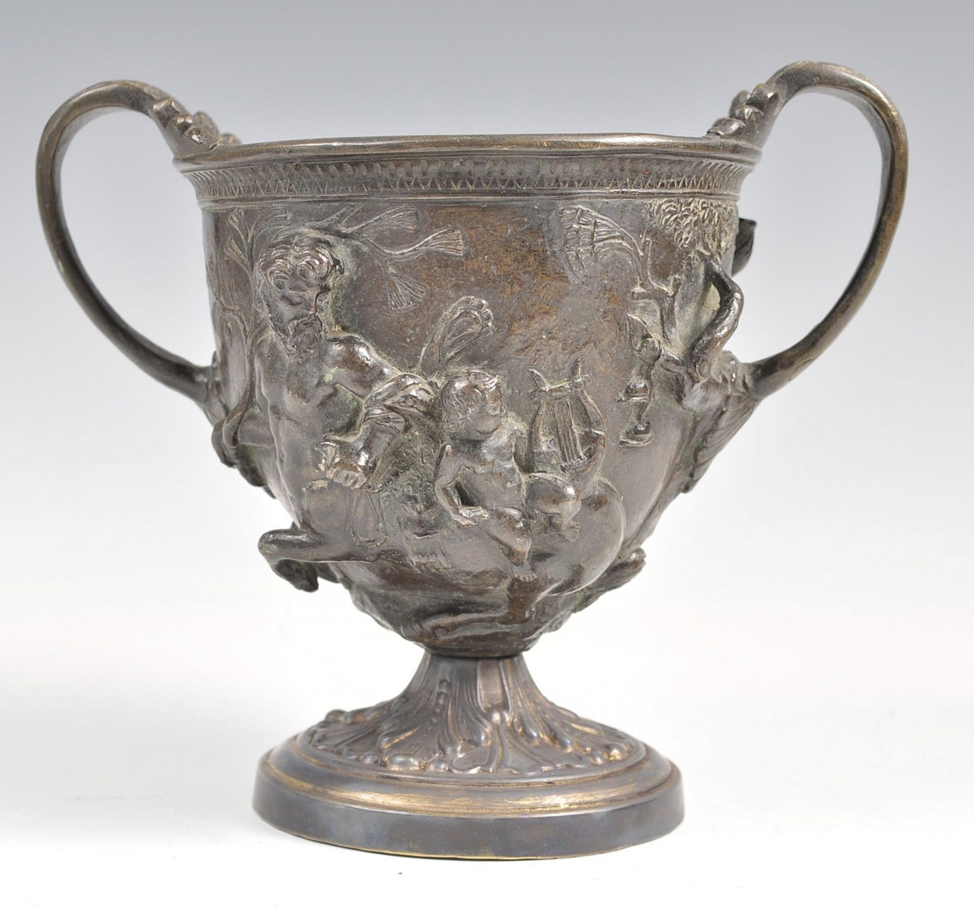 Early C19th grand tour bronze chalice cup decorated with classical figures