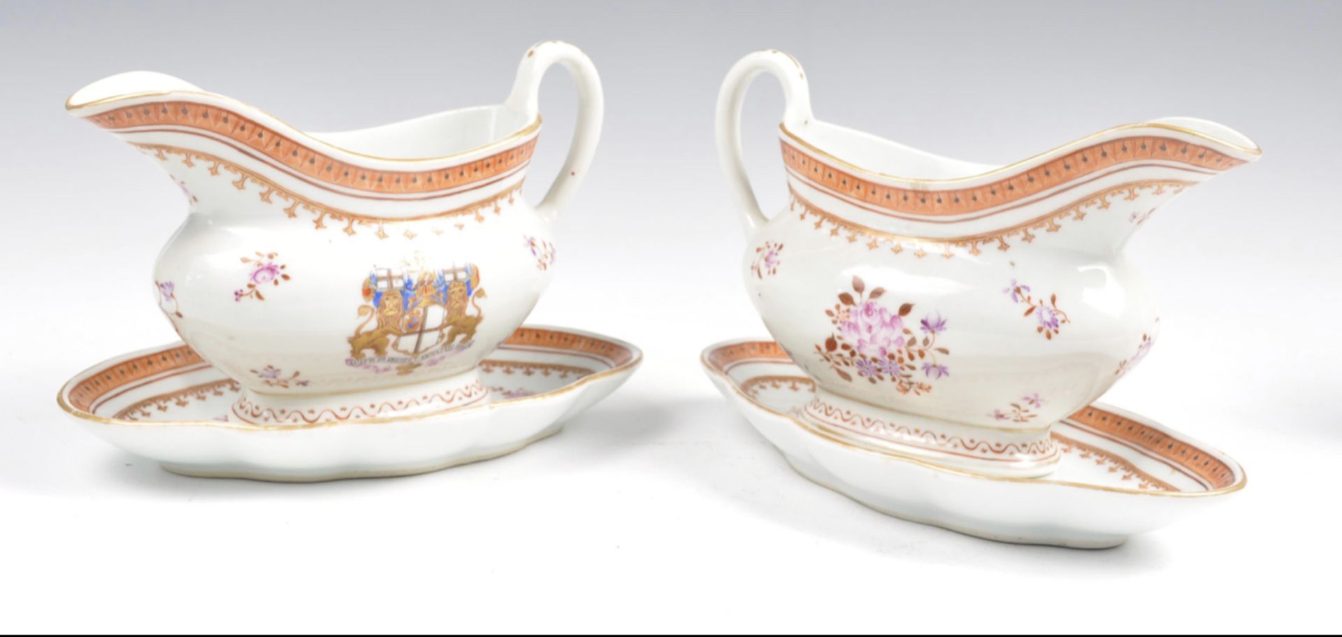 Pair of Samson engraved gravy boats and stands