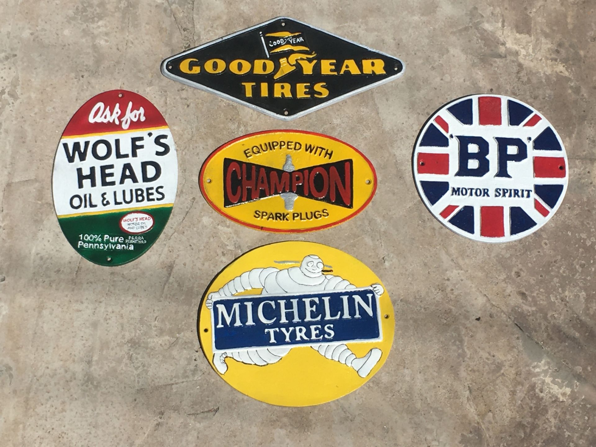 Collection of Petrol, Oil, Tyre Cast Iron Signs