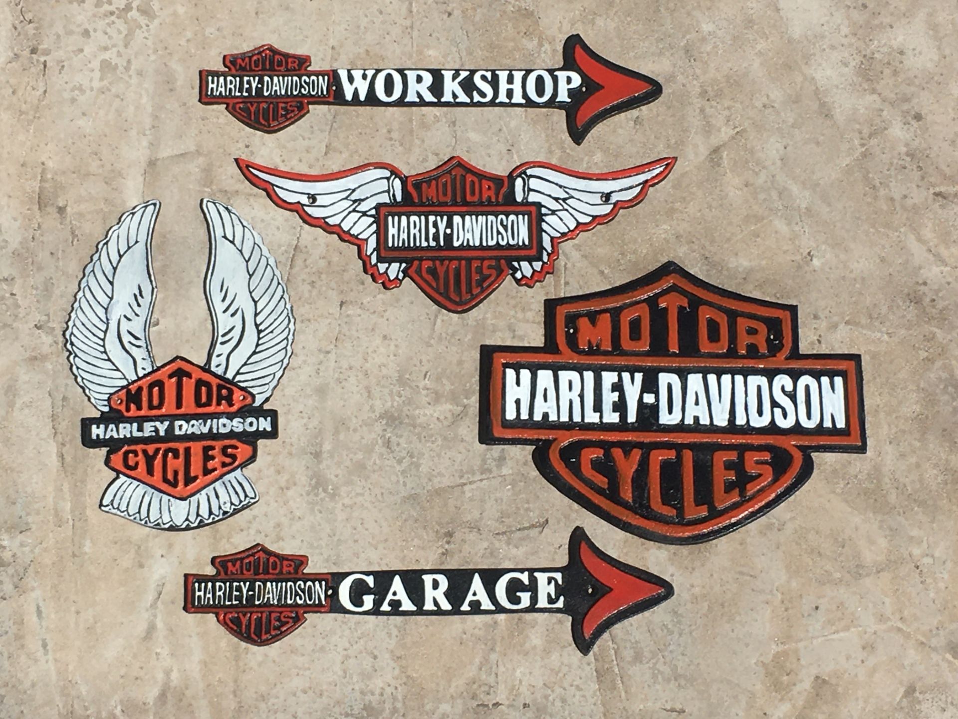 Collection Of Harley Davidson Cast Iron Signs