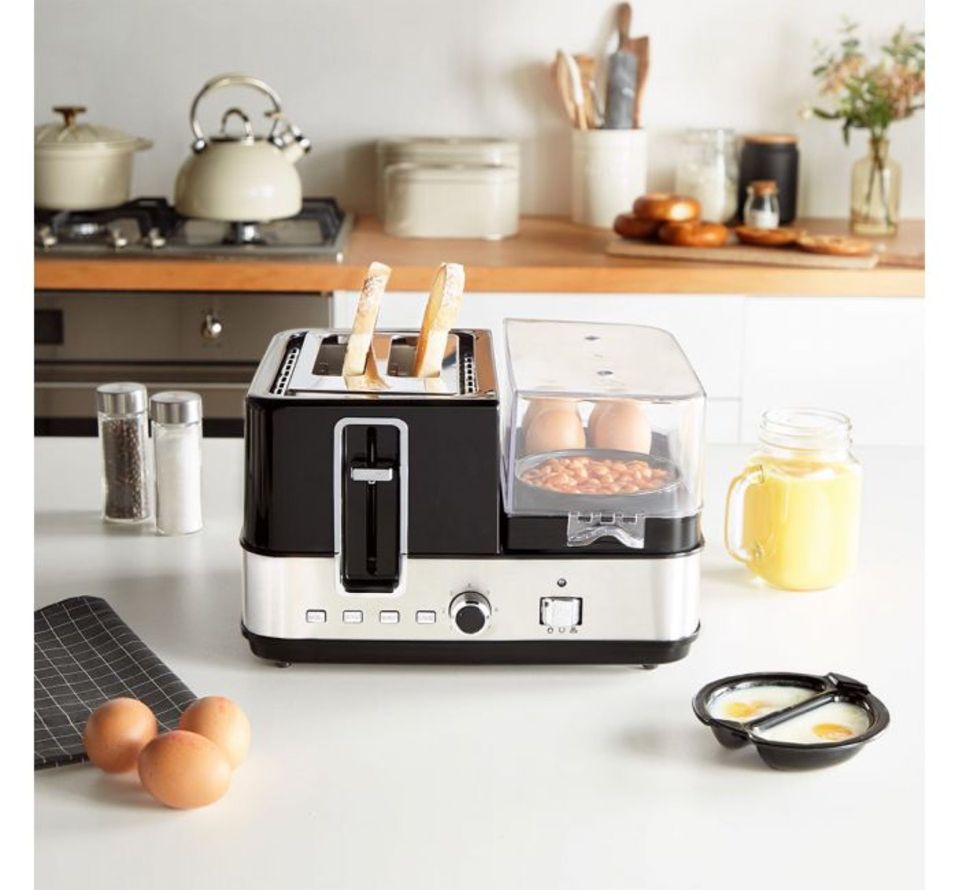 (D14) 2 in 1 Egg Boiler & Toaster The 2-in-1 Egg Boiler & Toaster can poach eggs in the poachi... - Image 2 of 4