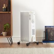 (KG23) 7 Fin 1500W Oil Filled Radiator - White. Equipped with 3 heat settings (600W/900W/1500W)...