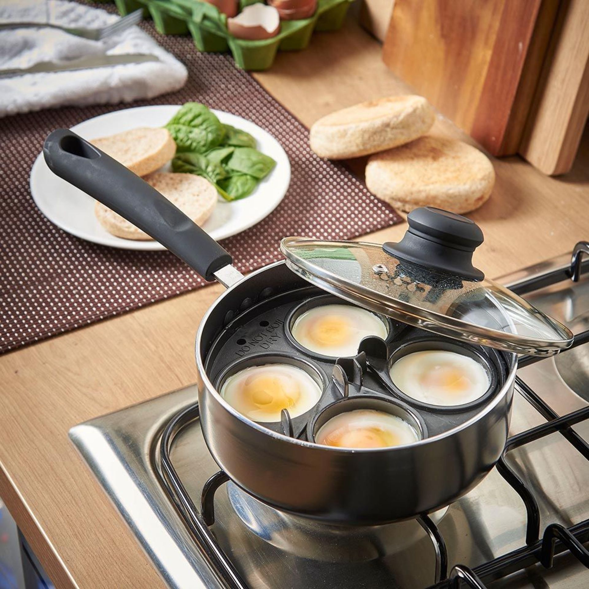 (KG34) Egg Poacher. Includes 4 removable egg cups and internal pan frame to hold them securely ...