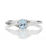 9ct White Gold Diamond and Blue Topaz Ring 0.01 Carats