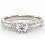 18ct White Gold Single Stone Diamond Ring With Double Chanel Set Shoulders (0.70) 0.83 Carats