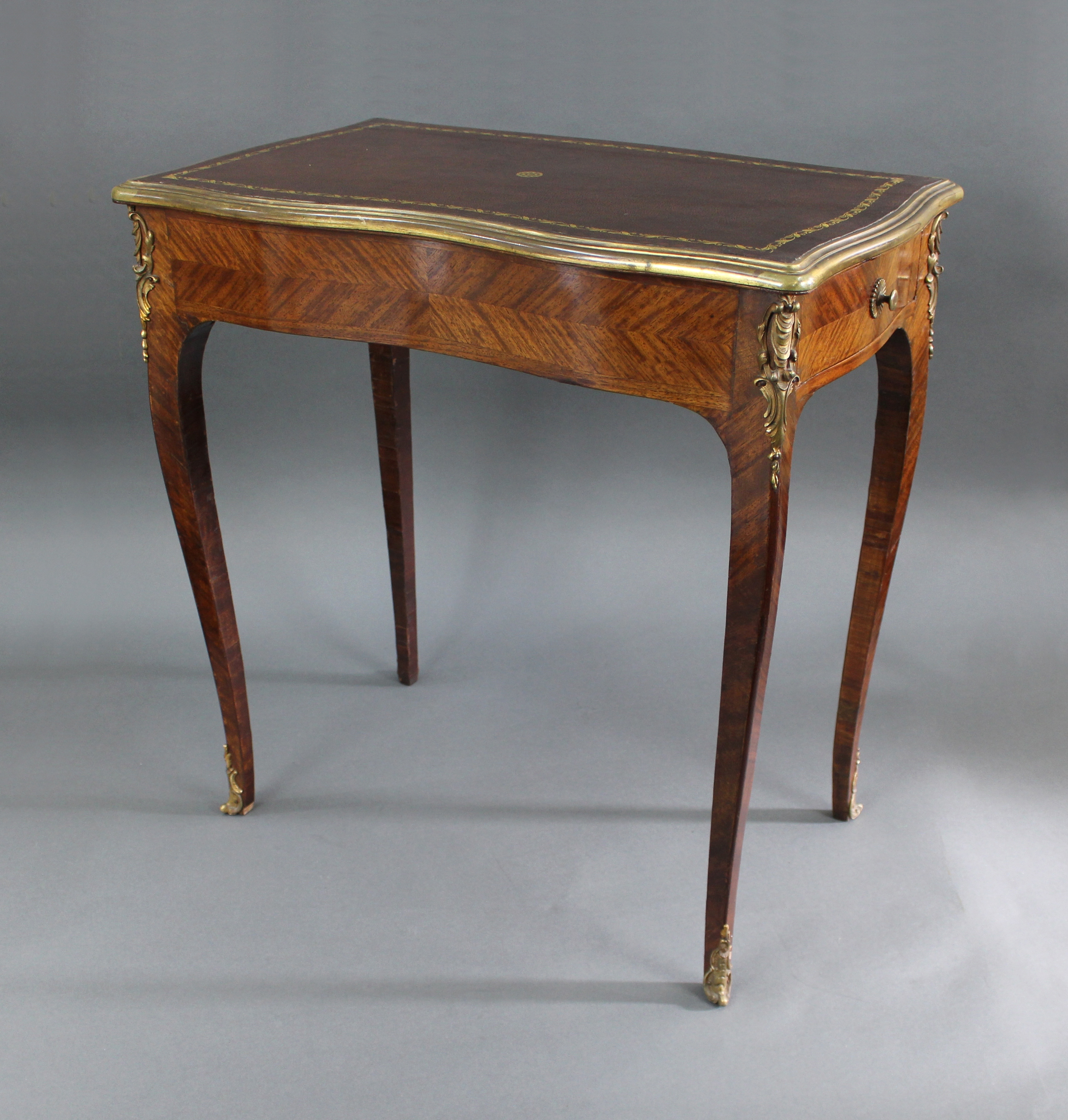 Serpentine Shaped Kingwood Writing Table with Brass Mounts c.1800