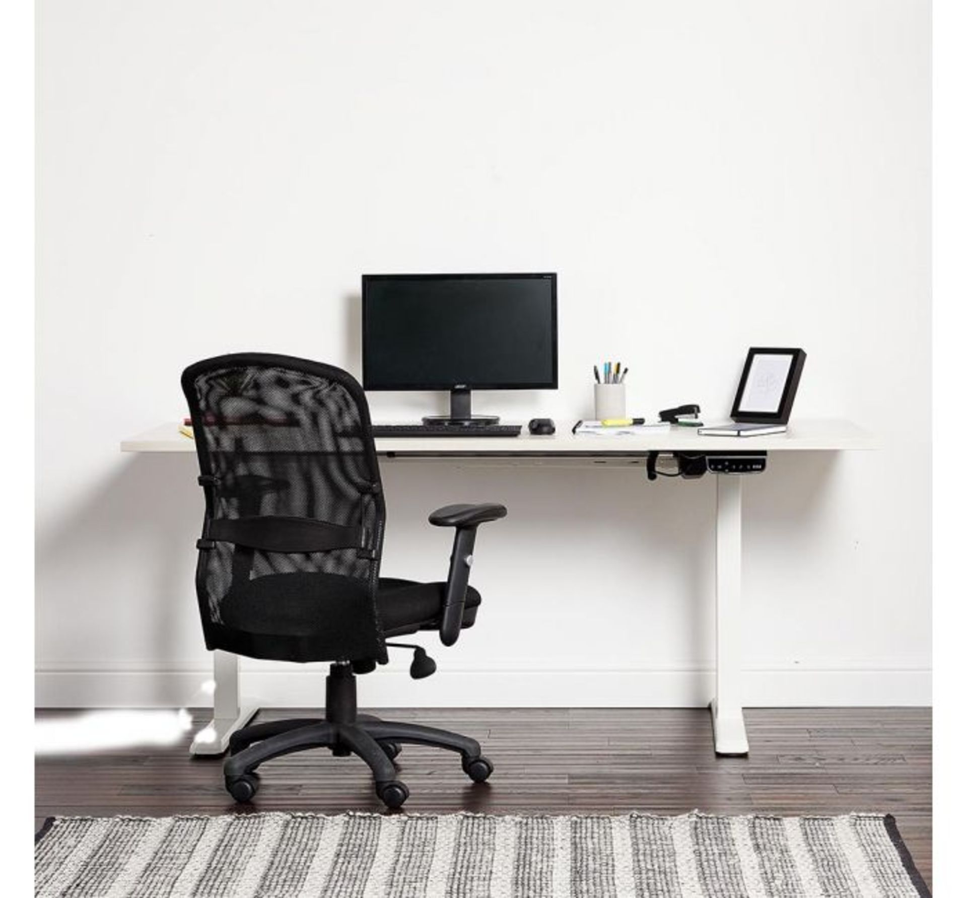 (HZ21) Electronic Sit / Stand Desk Frame This electronic frame lets you adjust the height of a...