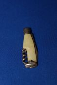 Small vintage novelty Bottle shaped pen knife and cork screw