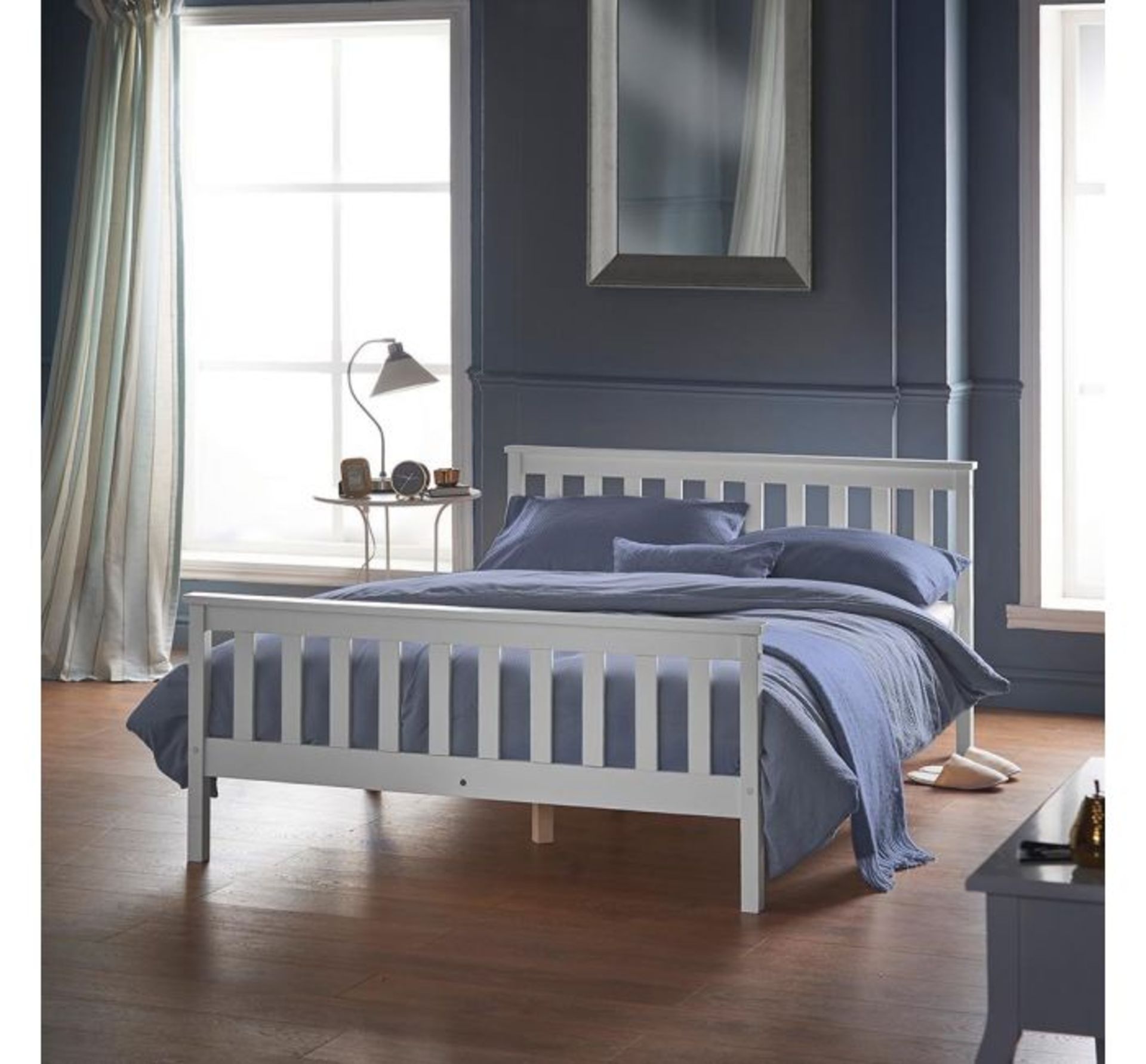 (AP110) Double Pine Bed Made from solid pine with a neutral white finish Slatted base is mini...