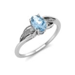 9ct White Gold Diamond And Oval Shape Blue Topaz Twist Ring 0.10 Carats