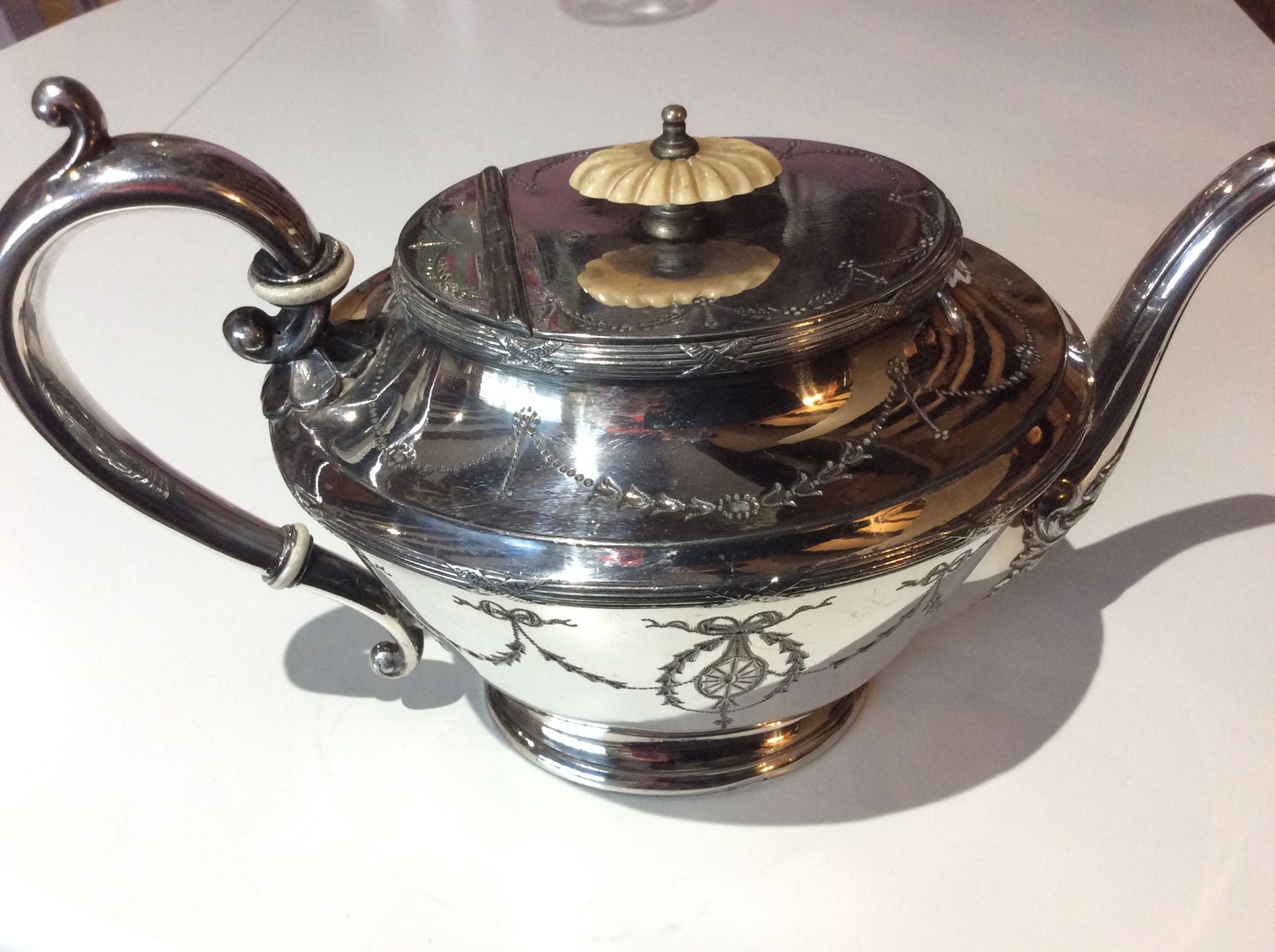 Antique highly decorative English tea pot silver plated