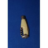 Small vintage novelty Bottle shaped pen knife and cork screw