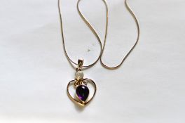 A Silver Amethyst & Opal Heart Shaped Pendant