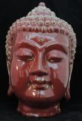 A Modern Sang De Boeuf Glazed Thai Bust Of Buddha