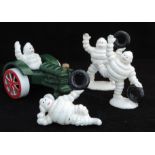 3 Small Cast Metal Michelin Men And 1 Michelin Figure On Tractor