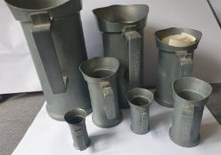 Set Of 7 Pewter Measuring Jugs