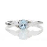 9ct White Gold Diamond and Blue Topaz Ring