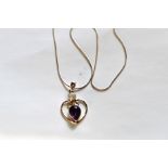 A Silver Amethyst & Opal Heart Shaped Pendant